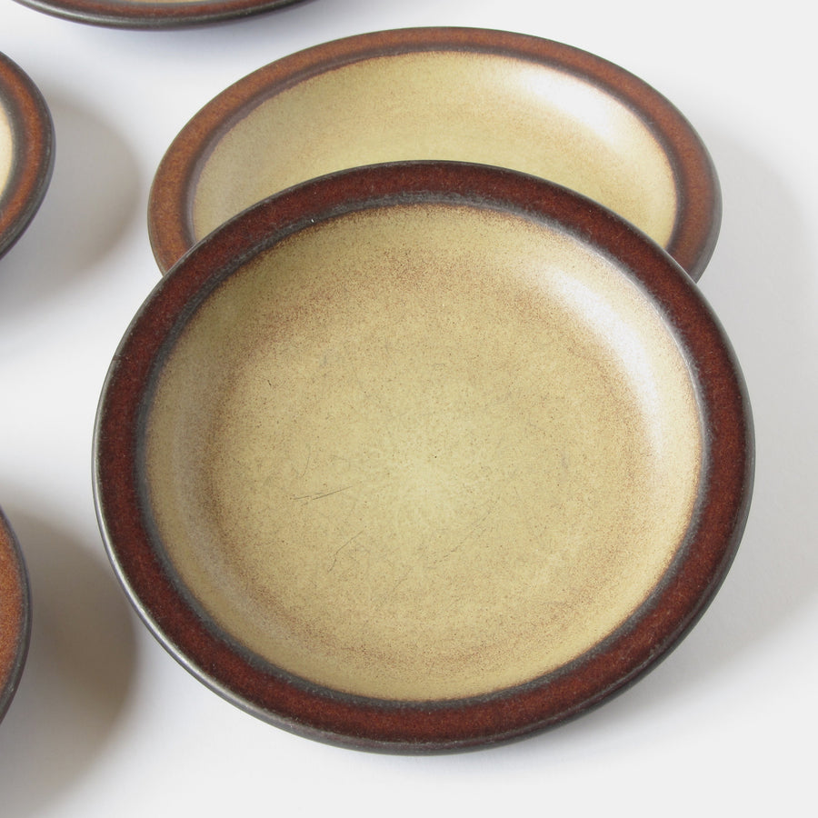 Heath salad and bread plates with two tone Mojave red glaze