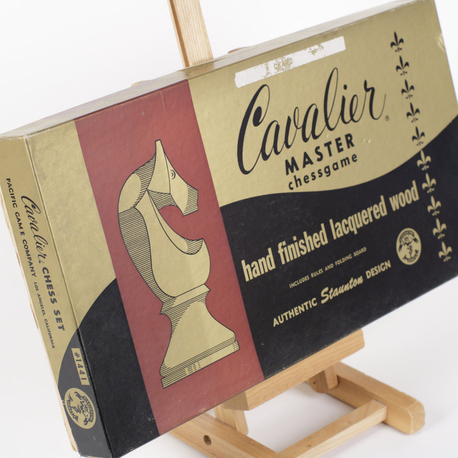 chess game box with gold black and red