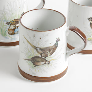 White ceramic mug with pheasant drawing made in Japan