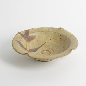 Mustard and rust glazed small ceramic bowl with leaf pattern