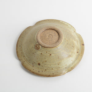 Small ceramic bowl showing makers mark 