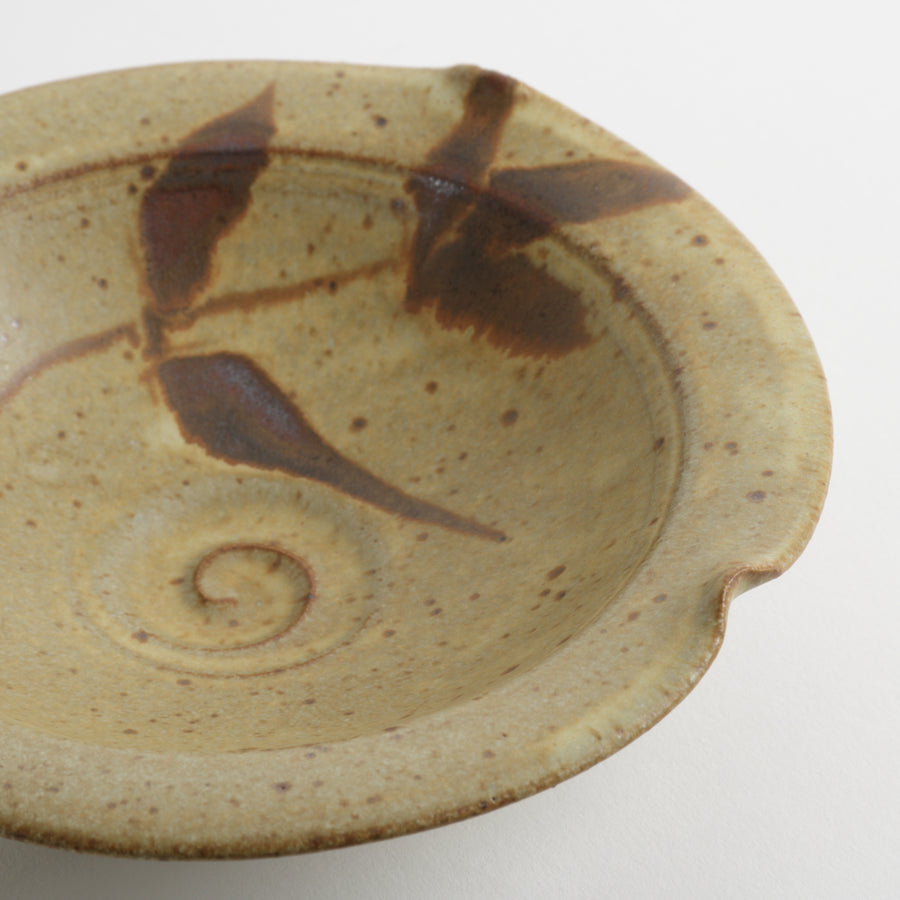 Mustard and rust glazed small ceramic bowl with leaf pattern