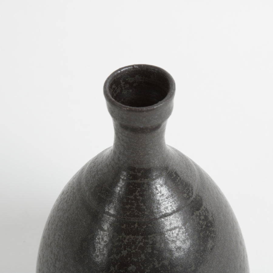 Small ceramic vase with black speckled glaze 