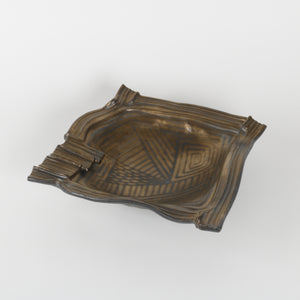Royce decorative dish with geometric pattern and striped glaze