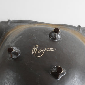 Royce ceramics signature at bottom with 3  small ceramic feet