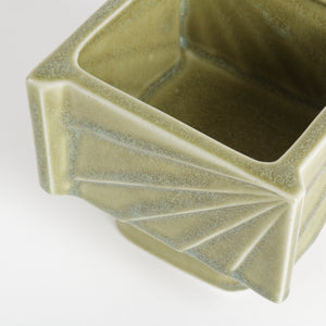 Small square green Japanese Ikebana vase closeup