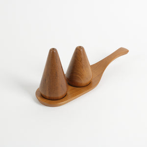 Cone shaped teak salt and pepper shaker set on tray