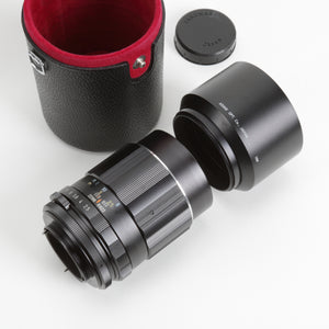Camera lens with a black case on a white background