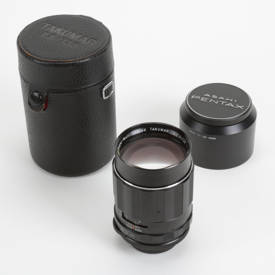 Camera lens with a black case on a white background