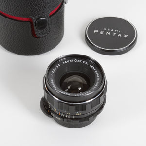 Asahi Pentax camera lens on a white background