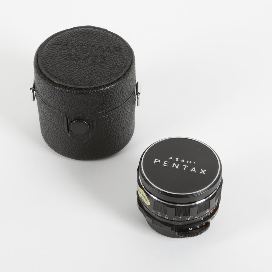 Asahi Pentax camera lens on a white background