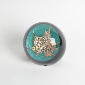 Acrylic paperweight with encased gold maple leaf