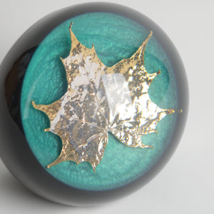 Acrylic resin paperweight closeup maple leaf