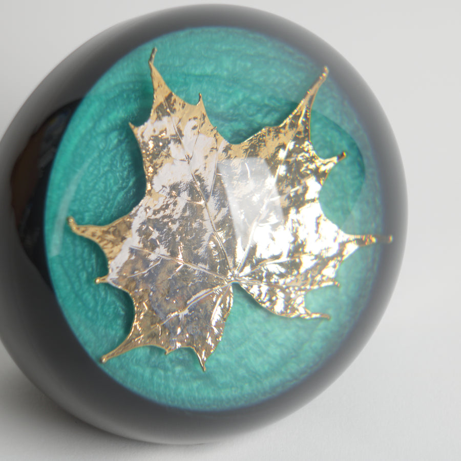 Acrylic paperweight with encased gold maple leaf