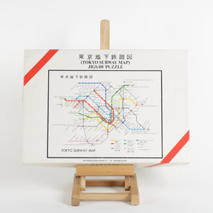 Puzzle of Tokyo subway map sitting on small easel 