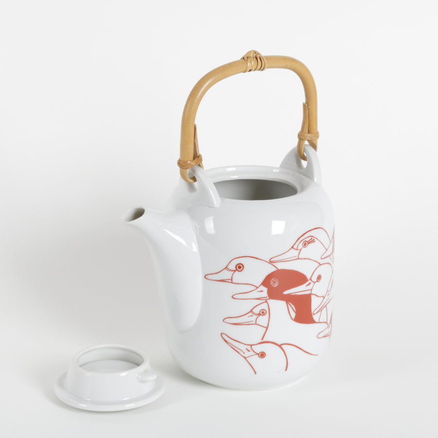 White teapot with goose decoration