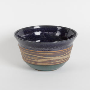 Ceramic bowl with two-tone design on a white background