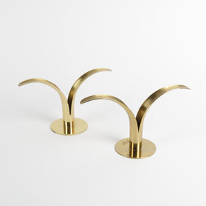 Set of two brass lily shaped candlesticks 