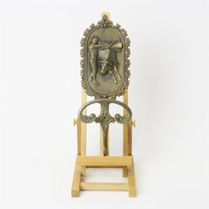 Brev brass coat hanger with bull and matador front