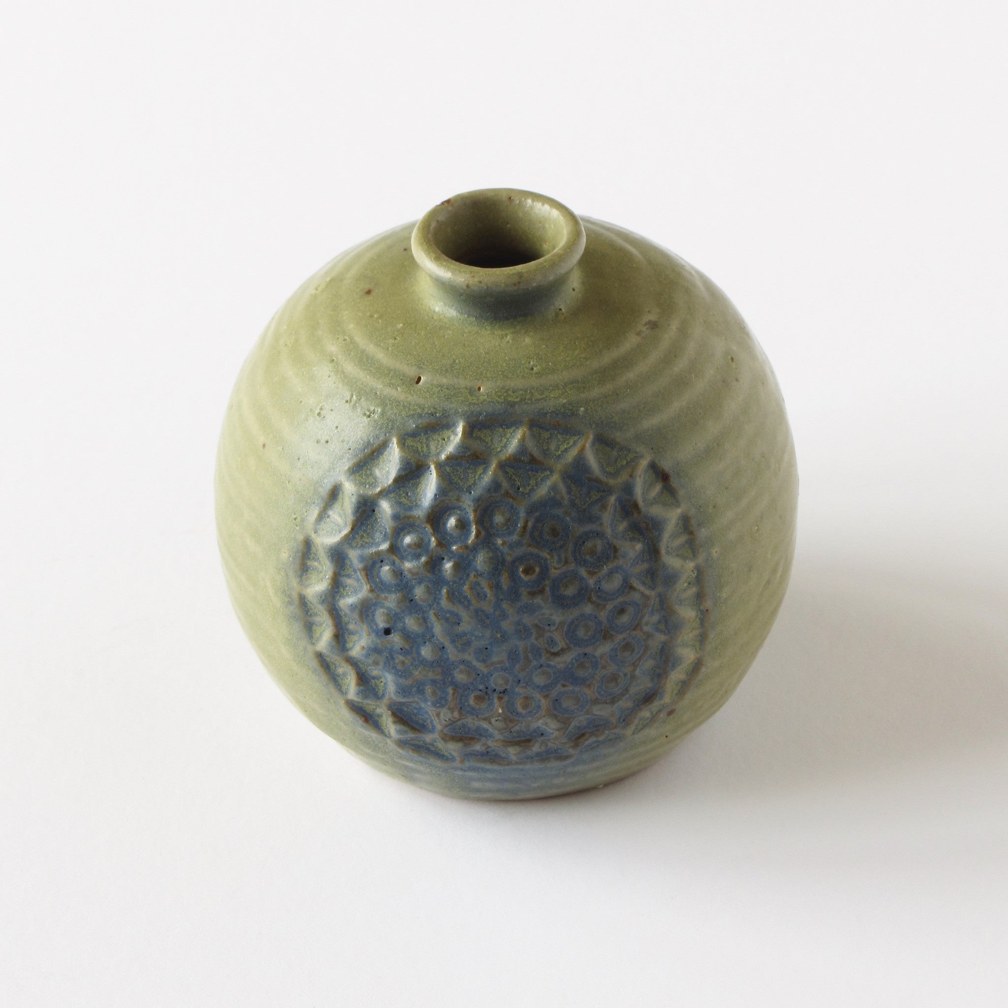 Danish modern bud vase in green with blue floral impression