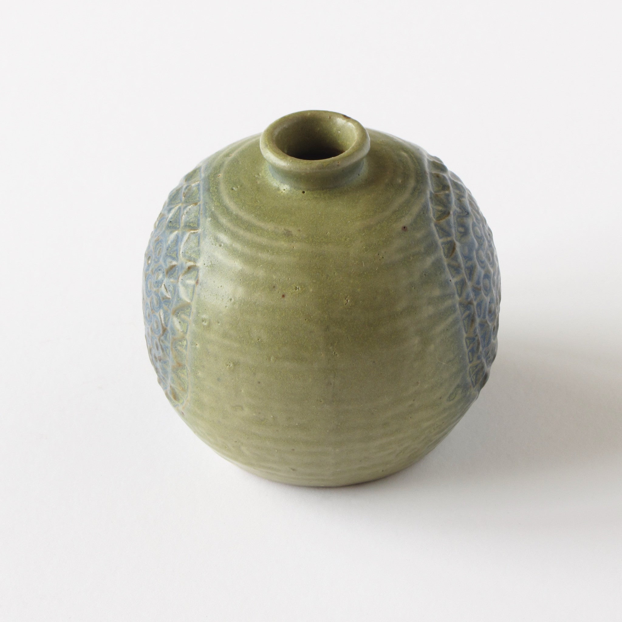 Danish modern bud vase in green with blue floral impression side view