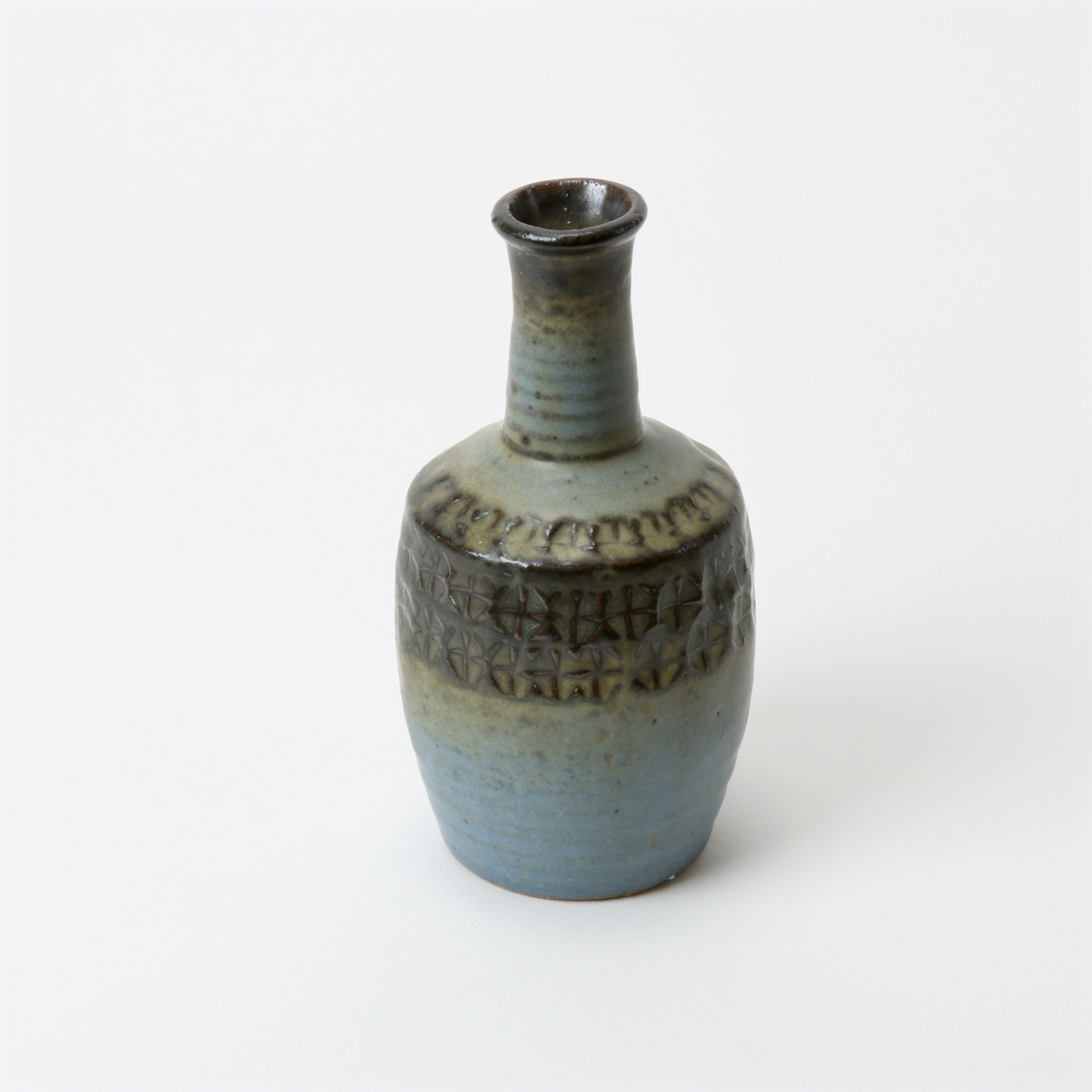 Embossed mid century flower vase in blue and mocha glaze