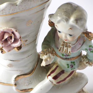 Estate figurine vase with small child