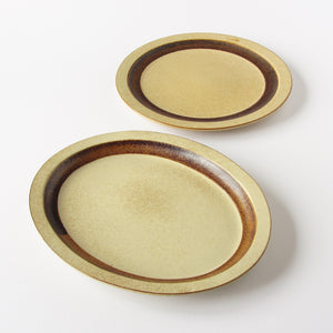 Set of 2 Pottery craft platters one oval and one round vintage tan and brown glaze