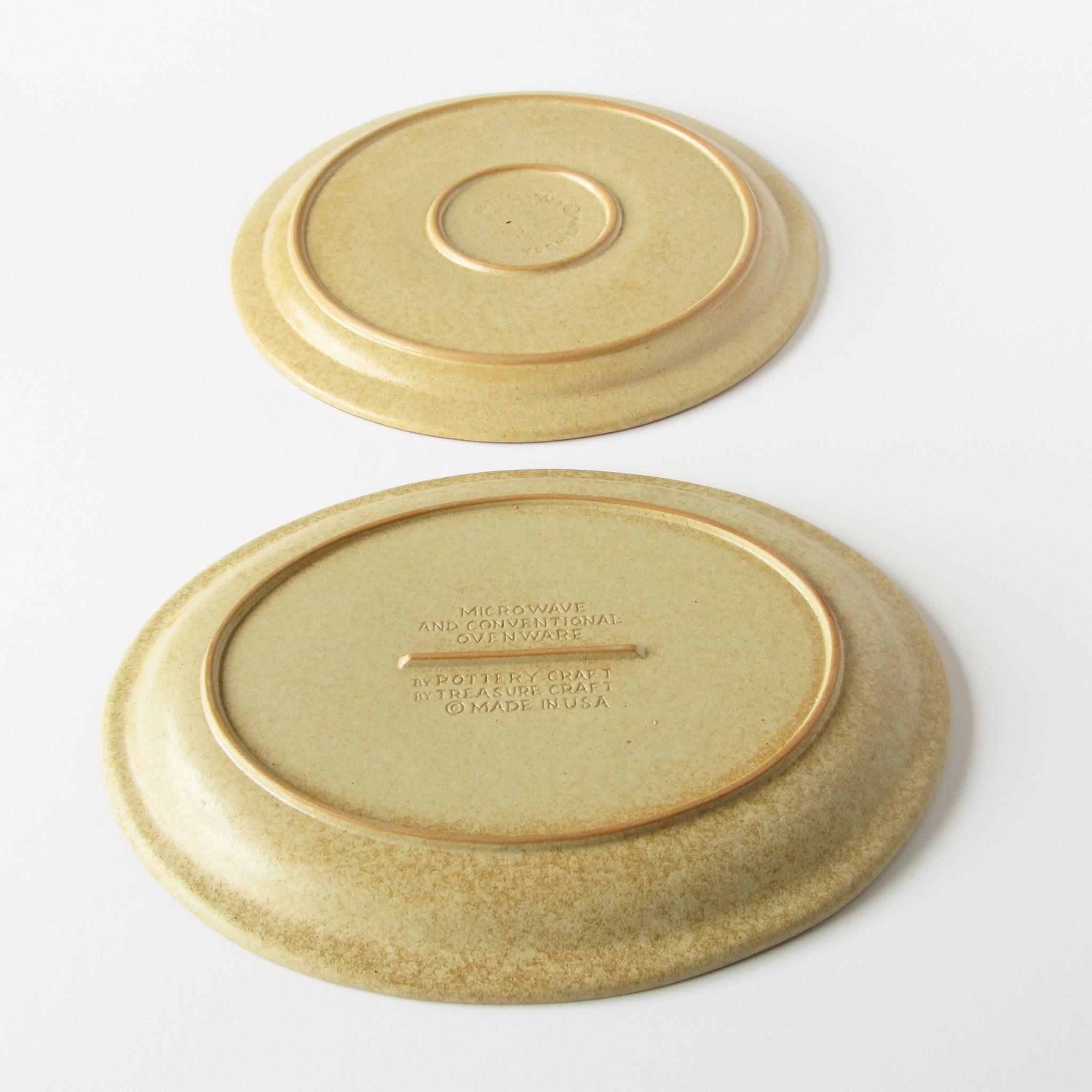 Pottery craft platter bottom with manufacturers stamp