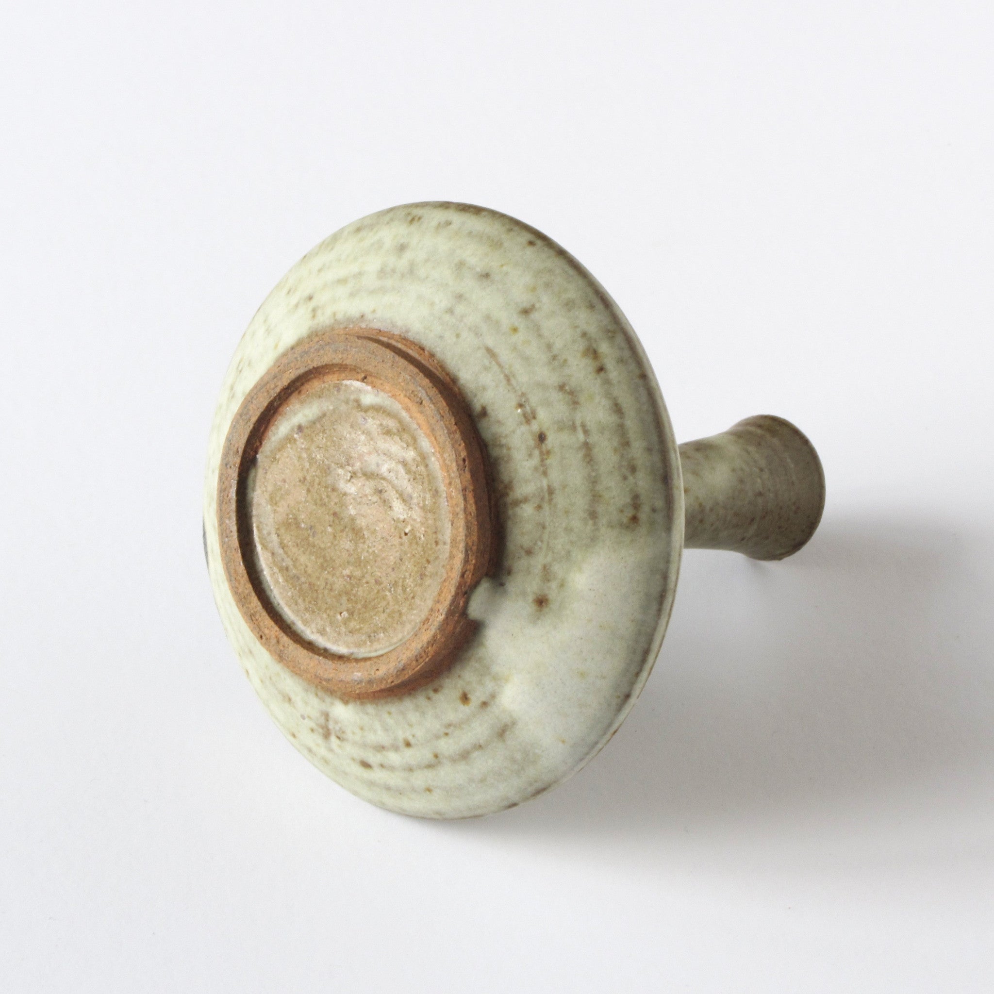 Mid century studio art pottery vase in multi-colored olive green glaze bottom view