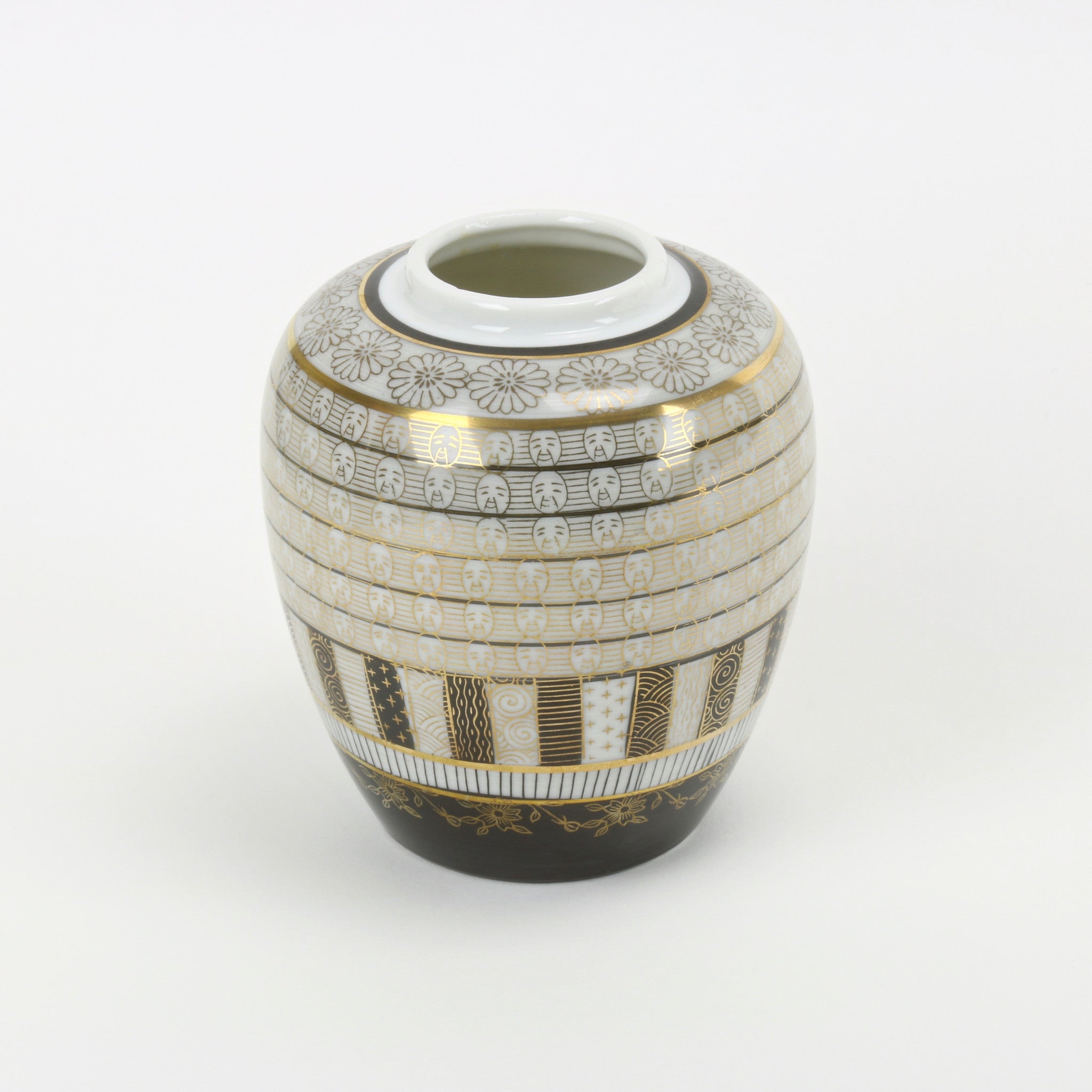 Toyo hand painted vase with gold faces and flower decorations alternate view